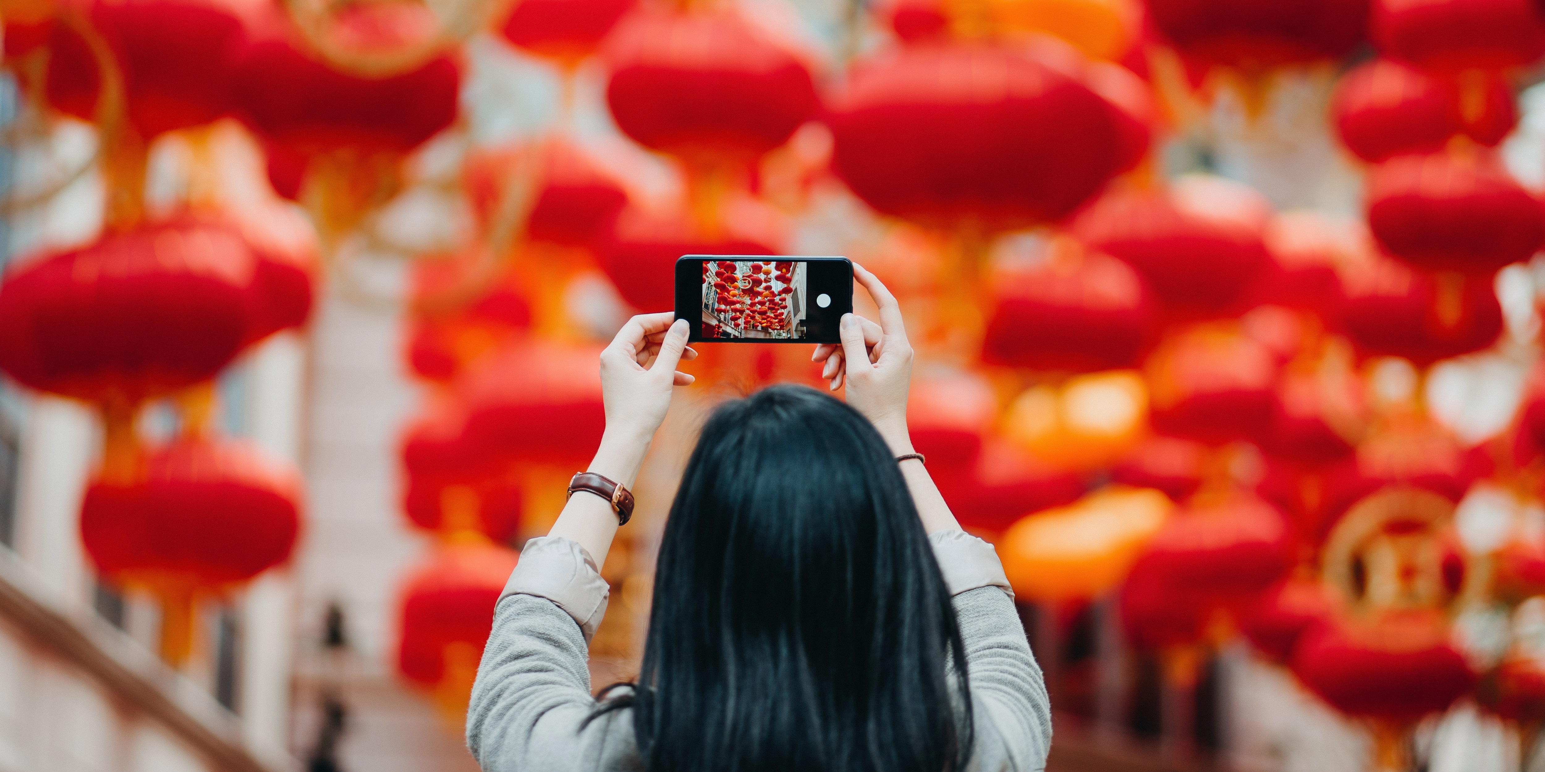 Young woman photographing