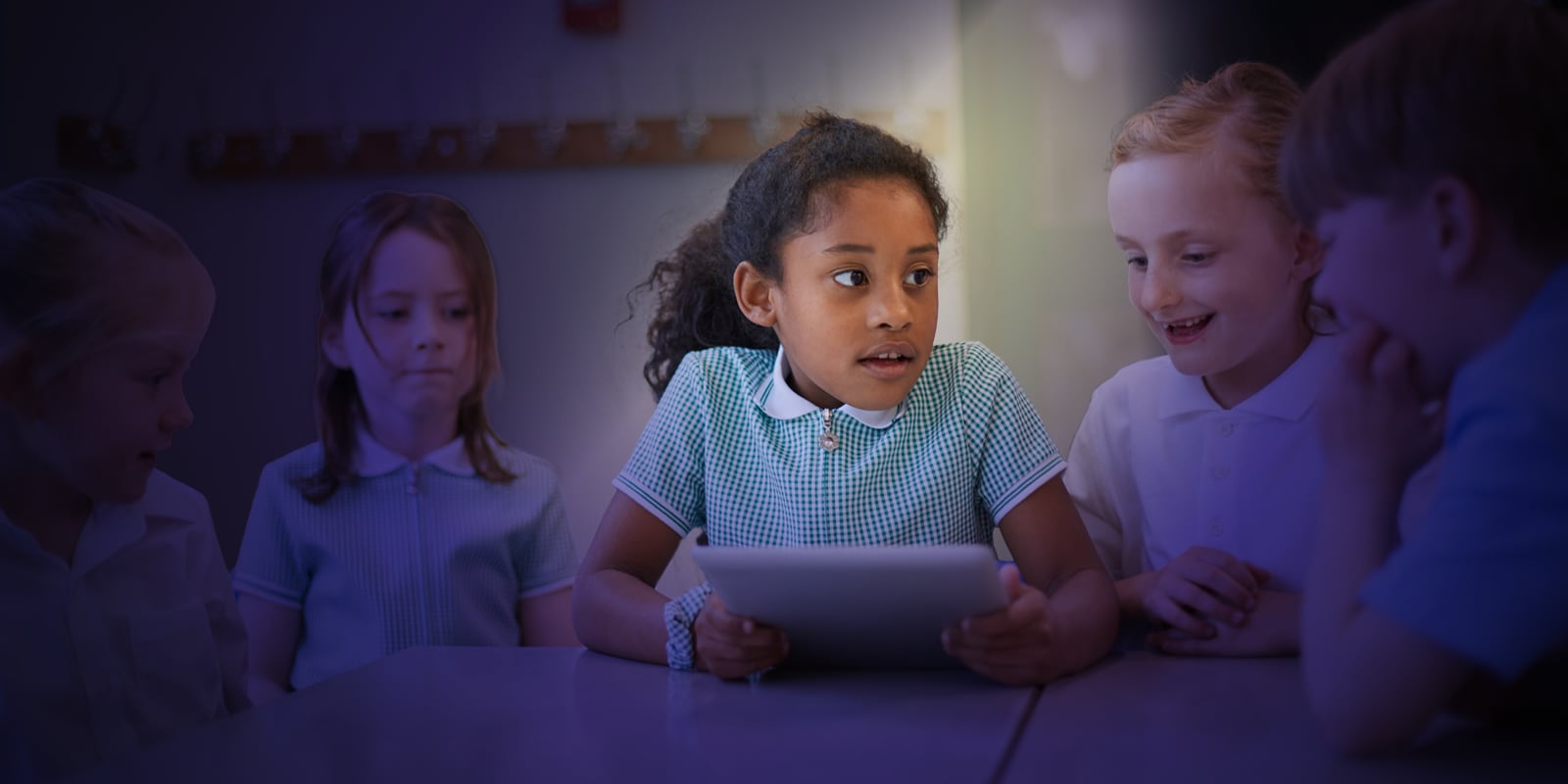 children in uniform in a classroom