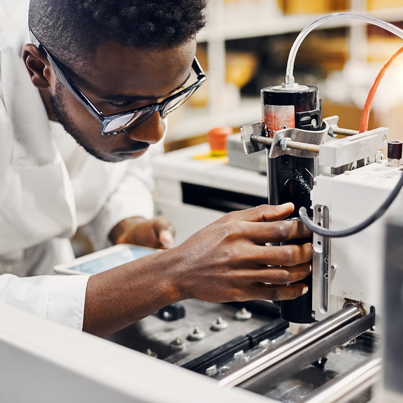 a young man using equipment