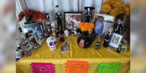 A table decorated to celebrate Day of the Dead.