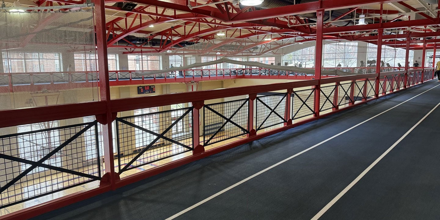 An upper-level indoor track at a fitness center.