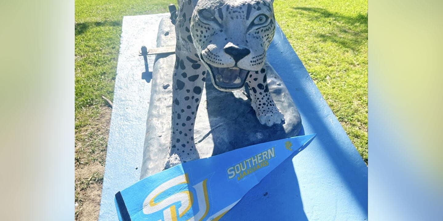 Jaguar statue with a Southern University pennant.