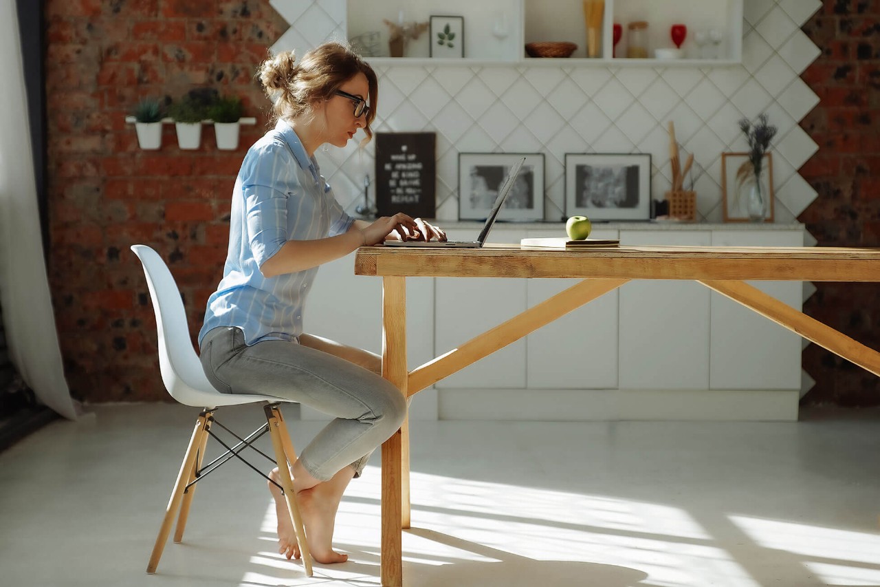 Woman on laptop at desk