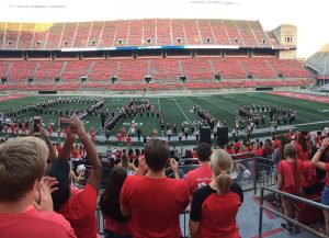 The Ohio State Marching Band spells out O-H-I-O on the football field.