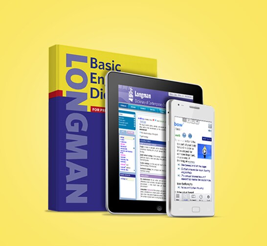 Image of dictionary, tablet and mobile phone on yellow background