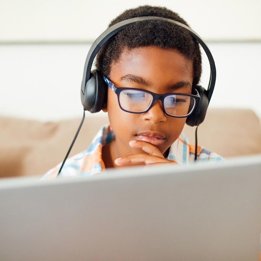 Image of a child using a laptop