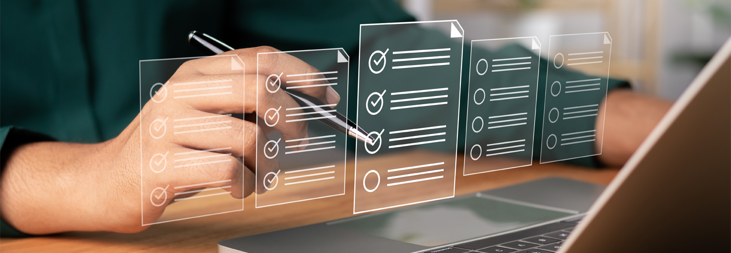 A person on a laptop with a checklist graphic in front of them