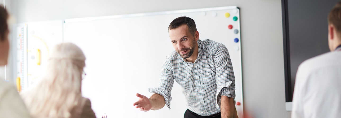 Male teaacher in class