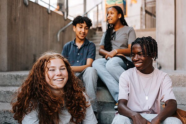 Three happy young students