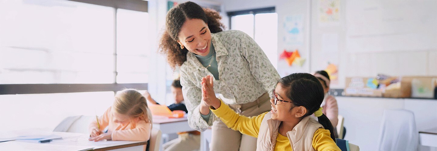 Teacherand pupil high five