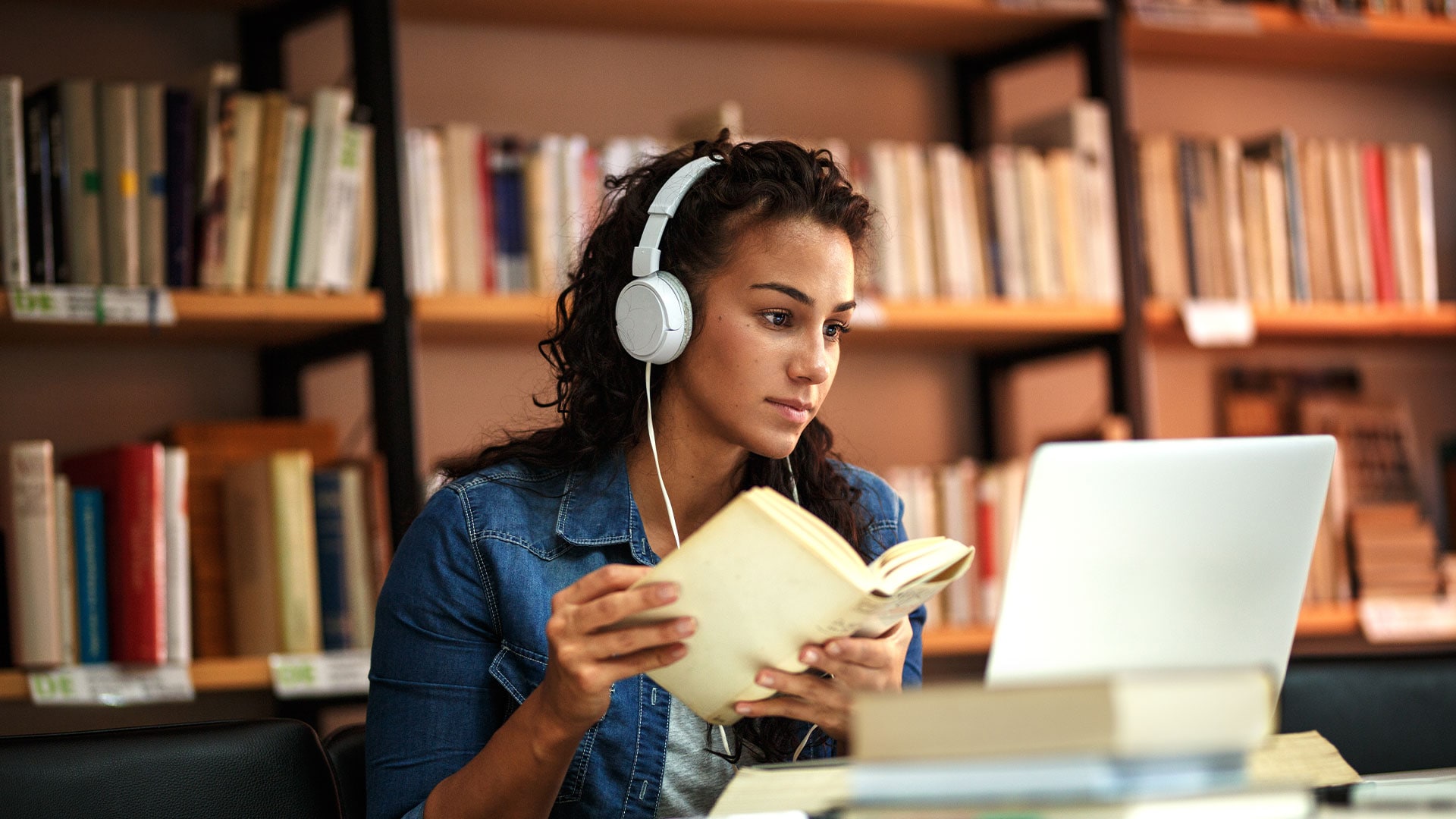 Image of girl with headphones taking a test