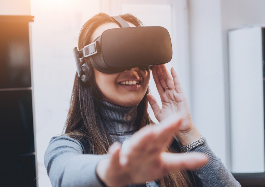 An image of a girl using a VR headset