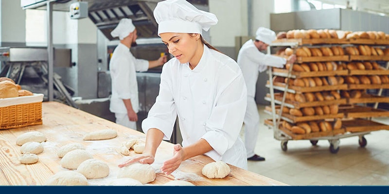 Bakers working in a professional bakery